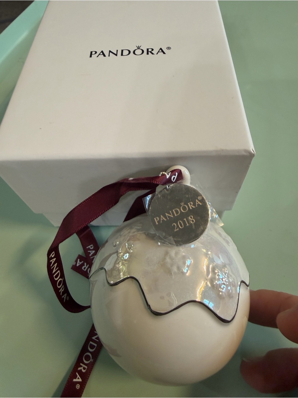 Pandora White and Iridescent Holiday Egg Ornament with Burgundy Ribbon